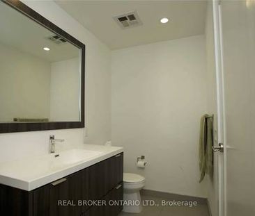 Feels brand new + den high ceilings parking included! - Photo 1