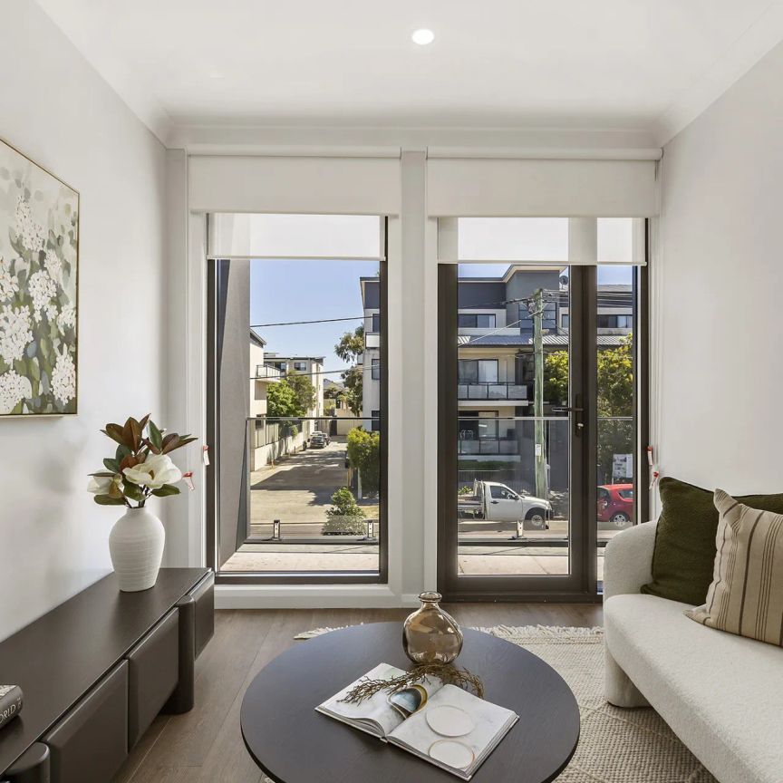 Brand New Four Bedroom Duplex In a Prime Location - Photo 1