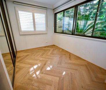 Luxury Garden Apartment Overlooking Cook + Phillip Park - Photo 4