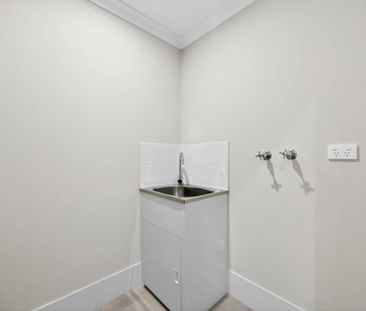 Low Maintenance Coastal Home - Photo 3