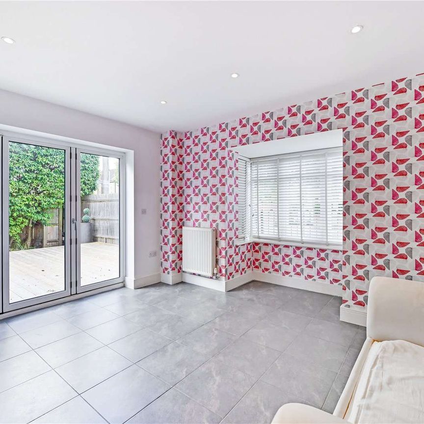 Spacious three bedroom semi-detached home with garden and gated off-street parking for two cars. - Photo 1