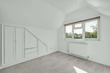 A beautifully extended, detached chalet-style home a short walk from Walton-on-Thames Mainline Station. - Photo 4