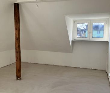 Gemütliche Dachgeschosswohnung mit Potential - Photo 2
