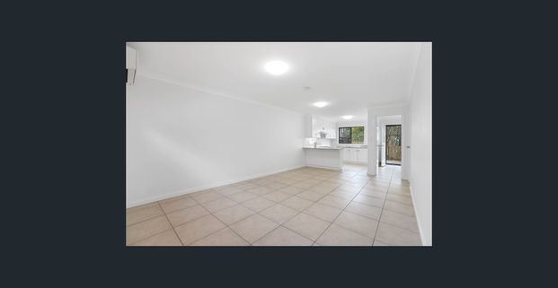 Spacious Two-Bedroom Townhouse in Convenient Location - Photo 1