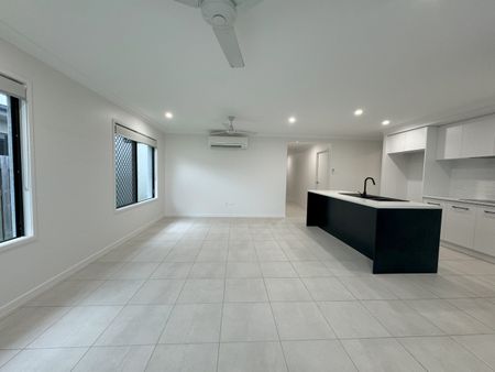 NEAR NEW 3 BEDROOM FAMILY HOME IN PERFECT LOCATION - Photo 2