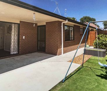 Sunny, Easy-Care Living in Sought-After Hillcrest - Photo 1