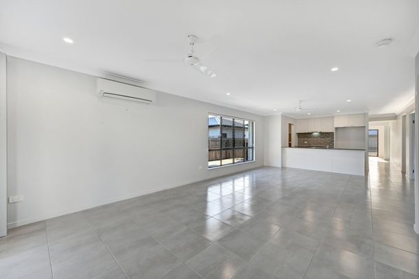 Modern Family Home with Pool in Prime Mount Low Location - Photo 1