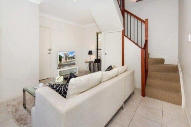 Conveniently located 2-story townhouse. - Photo 1