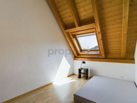 Generous 5.5-room penthouse apartment in Mels - Photo 4