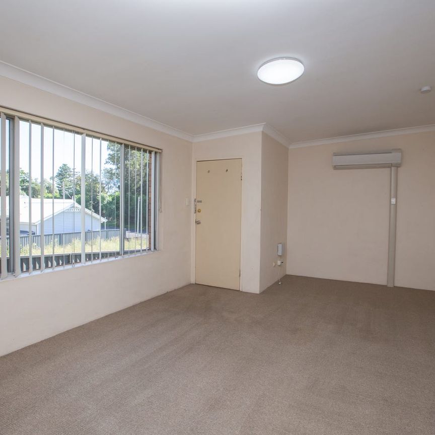 Two Bedroom Unit with Air Conditioner & Garage - Photo 1