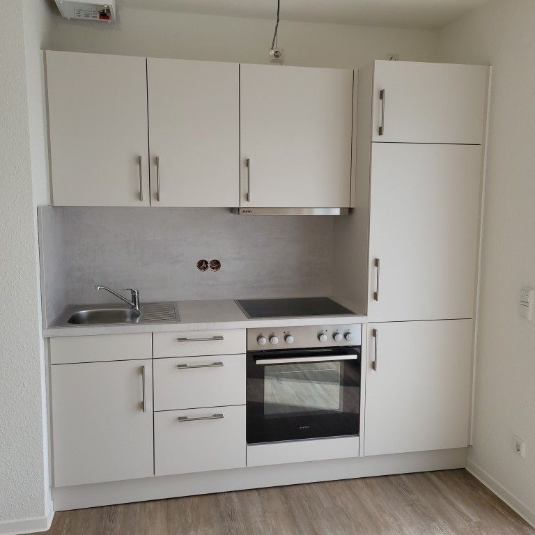 Neuwertige Single-Wohnung im Herzen der Stadt - Photo 1