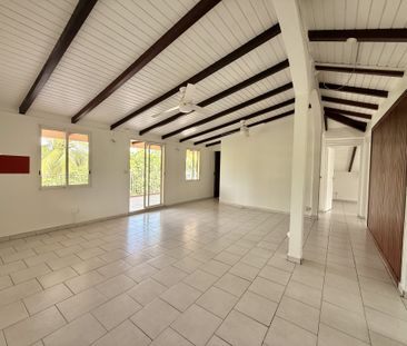Location Appartement 4 pièces 74m² LES ABYMES 97139 - Photo 2