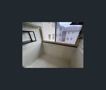 Convenient Top Floor Unit ! - Photo 6