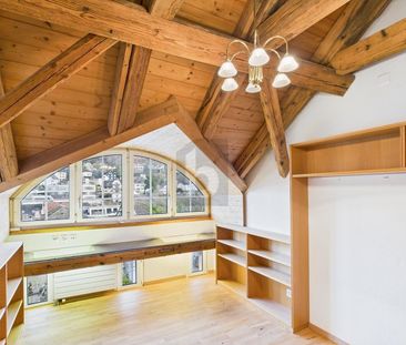 WITH VISIBLE BEAMS AND TILE STOVES! - Photo 5