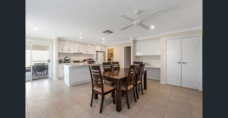 Spacious Three-Bedroom Home with Multiple Living Areas - Photo 2