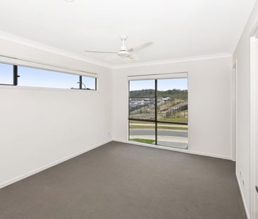 Two-Storey Home with Several Living Spaces and Air-Conditioning - Photo 5