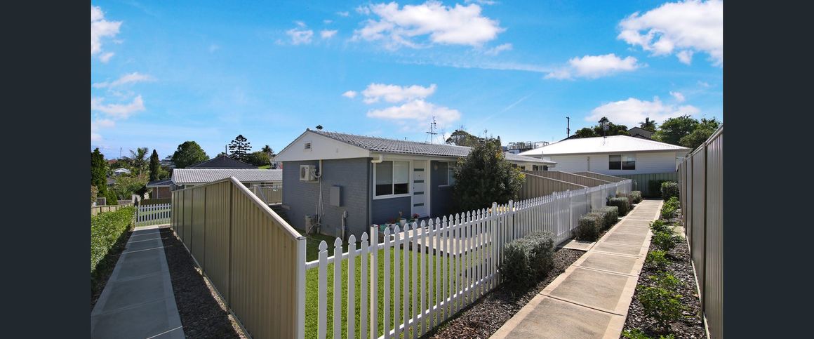 One bedroom, one bathroom villa in middle block of 3 - Photo 1