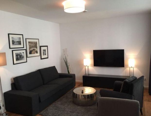 Neues, modern möbliertes Apartment mit Reinigungsservice in zentraler Lage - Foto 1
