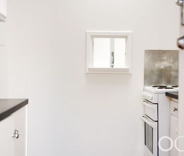 Open the Door to Peaceful Living in a Leafy Creekside Setting - Photo 2