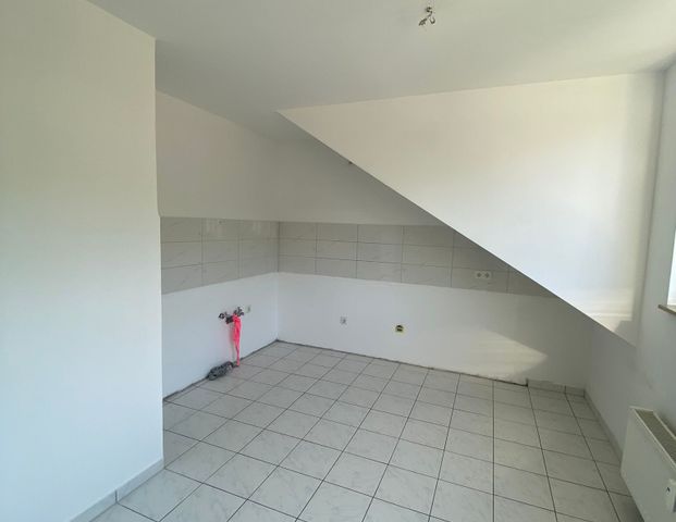 Geräumige Dachgeschosswohnung mit Blick ins Grüne in Dortmund - Photo 1