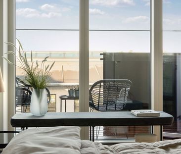 Skøn 2-værelses lejlighed med stor altan i et moderne byggeri - Photo 3