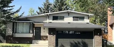 A blend of comfort and charm peaceful, three bedroom, two bathrooms | 555 Woodpark Crescent Southwest, Calgary - Photo 1