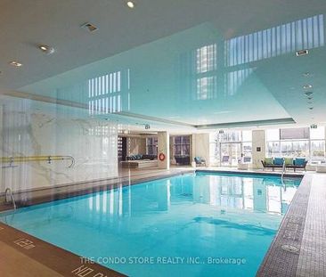 Feels brand new + den parking included indoor pool! - Photo 1