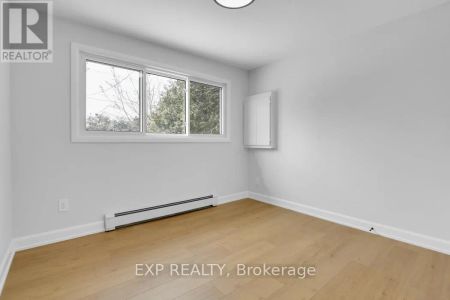 1 - 555 CHURCHILL AVENUE N - Photo 3