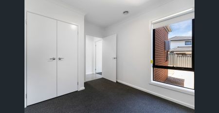 **RECEIVE ONE MONTH FREE RENT, ASK US HOW! Modern 4-Bedroom Home for Lease in Fraser Rise - Photo 3