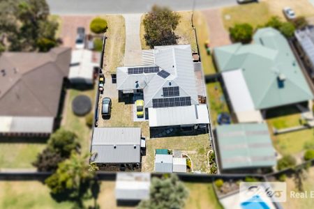 LAID BACK FAMILY LIVING WITH SIDE ACCESS AND LARGE, POWERED WORKSHOP - Photo 5