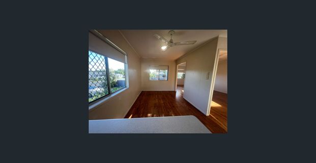 Updated Home with A/C + Fully Fenced Yard - Photo 1