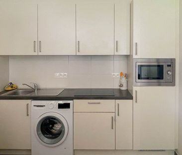 service flat met 1 slaapkamer en tuin + mogelijkheid tot parkeerplaats - Photo 6