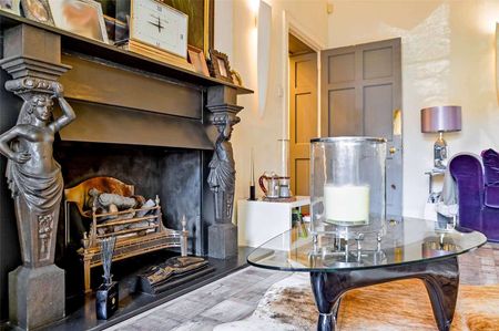 Nestled within glorious gardens and grounds, The Bellhouse is a townhouse wing of Hitcham House a remarkable Grade II listed Gothic Revival country home - Photo 2