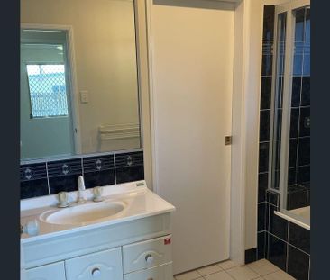 This neat and tidy low-set home offers comfortable coastal living i... - Photo 5