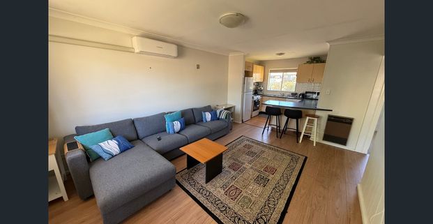 Conveniently Located 2-Bedroom Unit with Garage - Photo 1