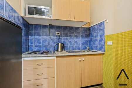 Furnished 2-Bedroom Apartment in the Heart of Newtown - Photo 5