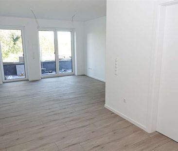 Neubauwohnung mit sonniger Dachterrasse in guter Lage von Schortens! - Foto 1