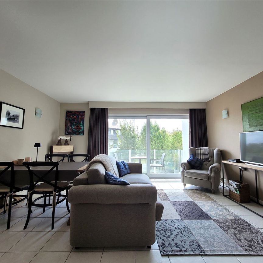 Lichtrijk appartement met garage box - Photo 1