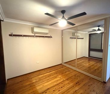 Unique Family Home in Prime Quakers Hill Location! - Photo 1