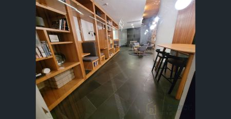 Furnished High-Floor 2BR Apartment with Sunlit Living & Luxury Amenities - Photo 4