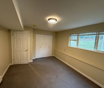 Newly Renovated 2-Bedroom Ground-Level Suite - Photo 2