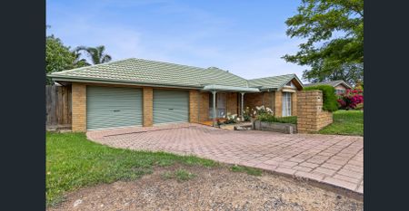Refreshed Four-Bedroom Home With Gated Side Access - Photo 3
