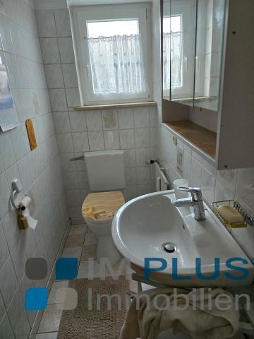 Große 2 Zimmer Garten-Wohnung mit EBK, überdachte Terrasse und 2 Stellplätzen ! - Foto 5