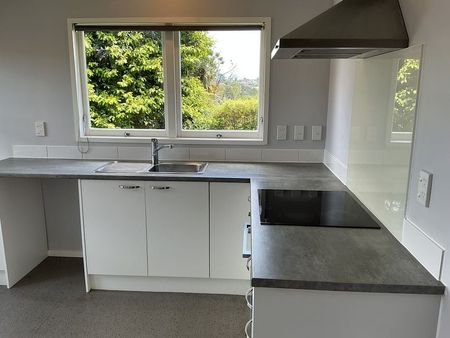 Charming 2BR Unit with Garden & Deck! - Photo 4