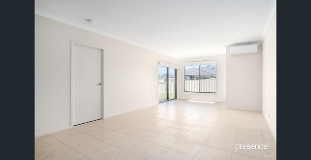 COMFORTABLE DUPLEX LIVING WITH AIR CONDITIONING & GARAGE - Photo 1