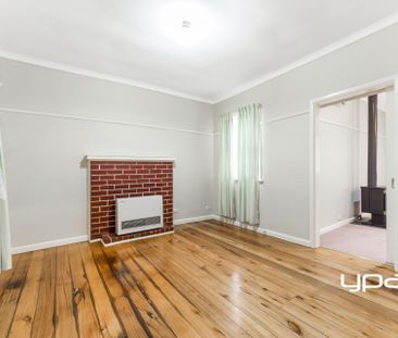 Charming Weatherboard Home in Prime Location - Photo 1