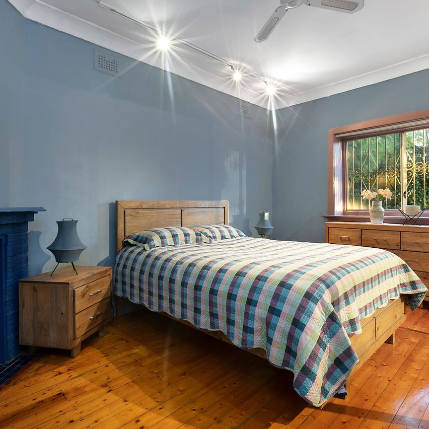 Charming full brick family oasis with two street access - Bordering Belmore - Photo 1