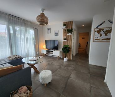 Appartement de 2,5 pièces au rez-de-chaussée avec jardin - Photo 2