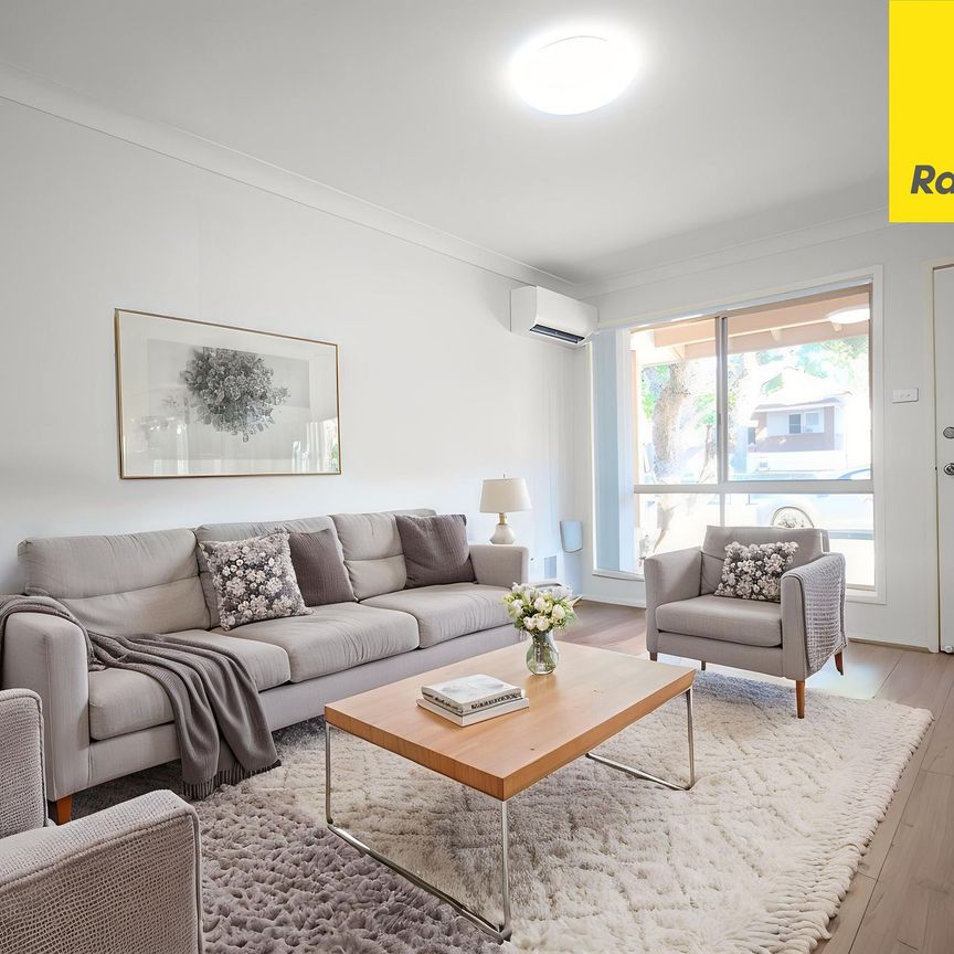 UPDATED STREET-FACING TOWNHOUSE WITH SPACE, STYLE & CONVENIENCE - Photo 1