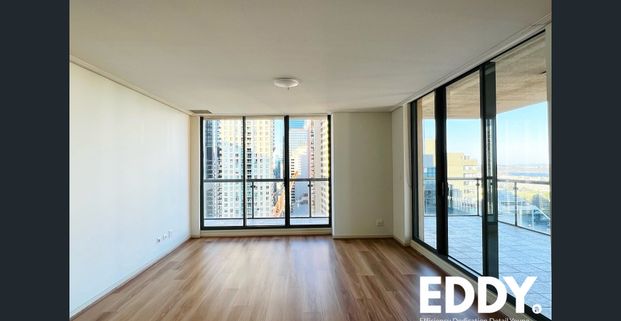 North-East Facing| Plenty of Natural Light | Gorgeous Ocean View and CBD View| Timber Floor Throughout the Apartment | Close to Everything - Photo 1